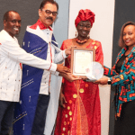 Jubilee Health Insurance CEO, Njeri Jomo (far right), receives the prestigious CEO of the Year Award during the 2024 Company of the Year Awards (COYA), hosted by the Kenya Institute of Management. She is pictured with (from left) Dr. Murithi Ndegwa, PhD, Executive Director & CEO of KIM; Vimal Shah, CEO of Bidco Africa; and Zachary Omukaka, Chairman of the OPI Technical Committee.