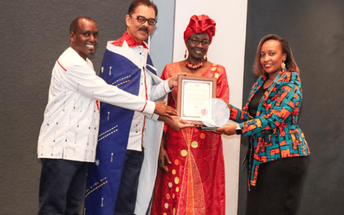 Jubilee Health Insurance CEO, Njeri Jomo (far right), receives the prestigious CEO of the Year Award during the 2024 Company of the Year Awards (COYA), hosted by the Kenya Institute of Management. She is pictured with (from left) Dr. Murithi Ndegwa, PhD, Executive Director & CEO of KIM; Vimal Shah, CEO of Bidco Africa; and Zachary Omukaka, Chairman of the OPI Technical Committee.