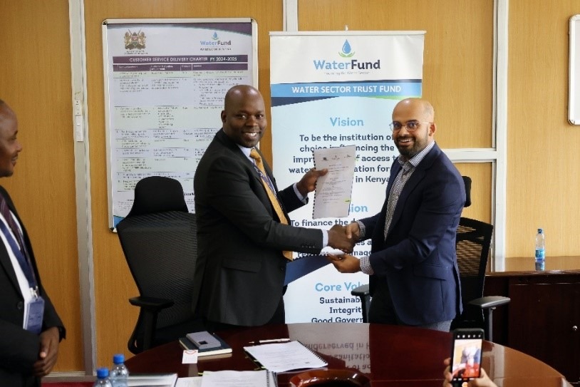WaterFund’s Chief Executive Officer, Mr. Willis Ombai, handed the signed contract to Danco Capital Director, Sachin Dhanani, during the official signing ceremony at the WaterFund offices in Nairobi.