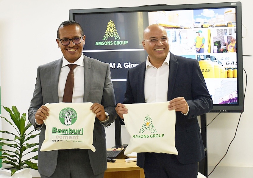 Amsons Group Managing Director Mr Edha Nahdi and Bamburi Cement CEO Mr Mohit Kapoor