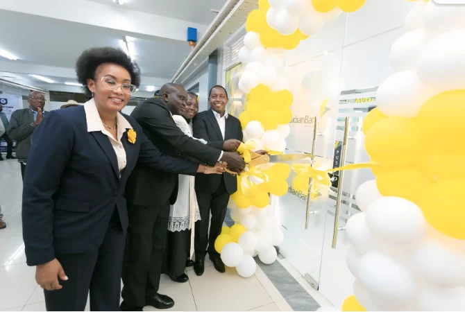 L-R : Sidian Bank, Head of Branches, Loise Mwangi, Buruburu Branch Manager Peter Ngari, Father James Mbugua St. Thomas Buruburu and CEO Chege Thumbi during the Sidian Bank Buruburu branch re-opening.