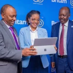 Britam Group Managing Director & CEO Tom Gitogo, Director Legal & Company Secretary Hilda Njeru and Britam Board Chairman Kuria Muchiru during the company's 29th AGM.