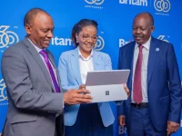 Britam Group Managing Director & CEO Tom Gitogo, Director Legal & Company Secretary Hilda Njeru and Britam Board Chairman Kuria Muchiru during the company's 29th AGM.