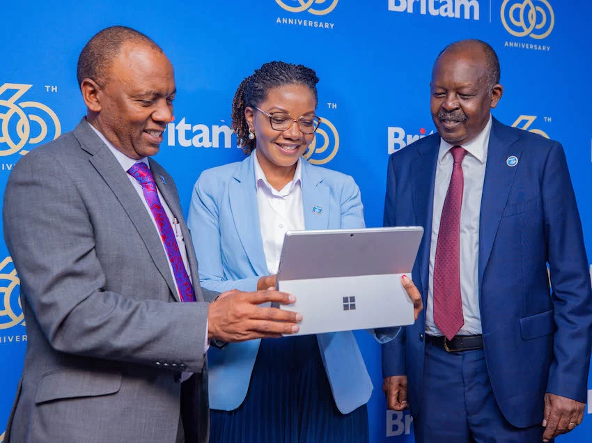 Britam Group Managing Director & CEO Tom Gitogo, Director Legal & Company Secretary Hilda Njeru and Britam Board Chairman Kuria Muchiru during the company's 29th AGM.