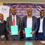 Enwealth Financial Services Director, Ken Monyoncho (Right) and Evangelical Alliance of Kenya General Secretary, Rev. Kepha Nyandega show the signed MoU to roll out the Biblical Financial Literacy Program for Children. The financial literacy program utilize EAK’s network of over 50,000 churches countrywide.