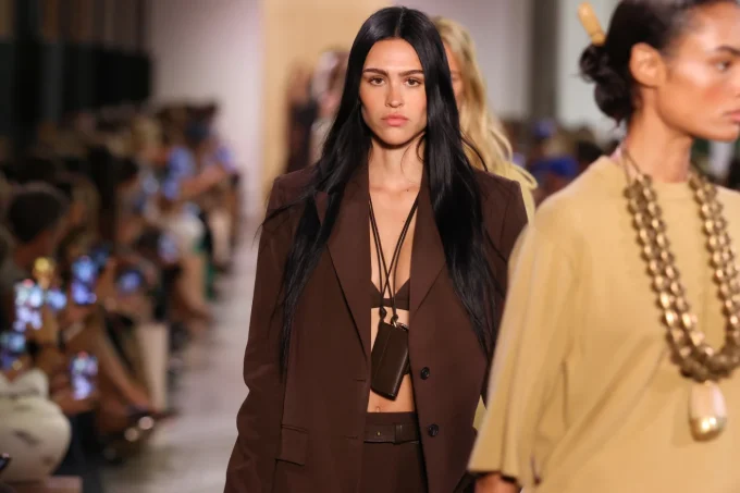 Amelia Gray walking for Michael Kors, who sent out earthy toned suits. JP Yim Getty Images