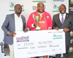 Harambee Stars coach Benni McCarthy receiving award. PHOTO/@OfficialSJAK/X