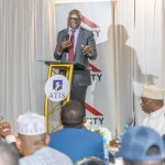 Equity Bank Kenya Managing Director Moses Nyabanda addresses the Eastleigh Business Community during the meeting.