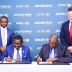 Octagon Africa Group CEO Fred Waswa (L) and AlexForbes CEO Growth Markets Jonathan Muthige (R) during the signing of the strategic partnership