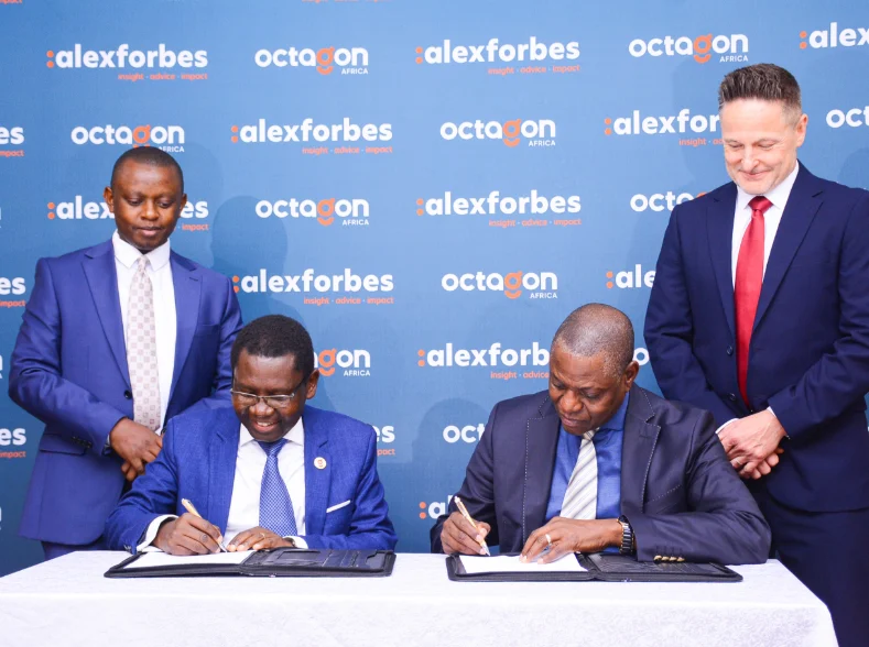 Octagon Africa Group CEO Fred Waswa (L) and AlexForbes CEO Growth Markets Jonathan Muthige (R) during the signing of the strategic partnership