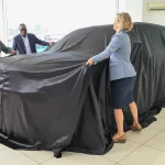 PS Trade Regina Ombam (L) US Embassy Deputy Head of Mission Carla Benini (R) and Urysia Ltd MD Claude Mwende unveil Jeep & Citroen as part of Urysia's expanded brand portfolio