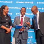 Sanlam Allianz Life Insurance (Kenya) Limited Chief Executive Officer Ms. Jacqueline Karasha (left) joins Sanlam Allianz Holdings (Kenya) PLC Group CEO Dr. PatrickTumbo (centre) and SanlamAllianz General Ins