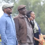 Widows Empowerment Program patron Raymond Omollo and Oburu Odinga