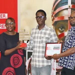 Stephen Maosa receives People's Choice Award from ALLPI, Executive Director, Nicholas Mudungwe at RLSD Africa