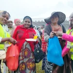Widows at Jaramogi Oginga Odinga University of Science and Technology in Bondo, Siaya County, as they line up to take part in the Widows Empowerment Program.