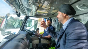 Image 2 (1) From Left - Managing Director, Africa Global Logistics Kenya, Martin Mwangi and CFAO Mobility Kenya, Managing Director, Arvinder Reel inside the cabin of one of the 32 new Sinotruks during the official handover ceremony.