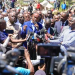Kiambu Governor Kimani Wamatangi addresses the press after his car wash business was demolished