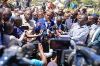 Kiambu Governor Kimani Wamatangi addresses the press after his car wash business was demolished