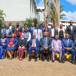 PS Raymond Omollo poses for a photo with regional security chiefs.