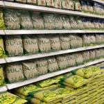 Sugar on shelves in a supermarket