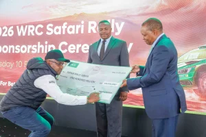 From left, KCB Group CEO Paul Russo signs a cheque as the PS State Department for Sports, Elijah Mwangi, and Safari Rally CEO Charles Gacheru look on during the official launch of the 2026 KCB WRC Safari Rally Sponsorship at KICC, Nairobi, on February 10, 2026