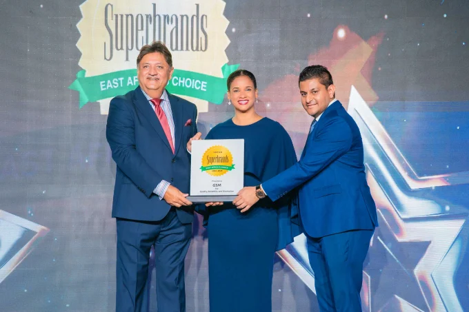 Superbrands Project Director Jawad Jaffer with Council Member, Darshan Chandaria presenting the award to GSM 2026