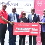 Absa Bank Kenya CEO Abdi Mohamed (2nd Right) and Marketing & Corporate Affairs Director Mwihaki Wachira (Centre) present the sponsorship cheque for Magical Kenya Open Patrick Obath(R)