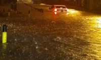 A car stuck in a flooded road