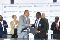 Omon Ukpoma-Olaiya, Regional Investment Team Lead (East & Southern Africa & Arab States) at the United Nations Capital Development Fund (UNCDF) and Vincent Marangu, Director Co-operatives Banking Division, C