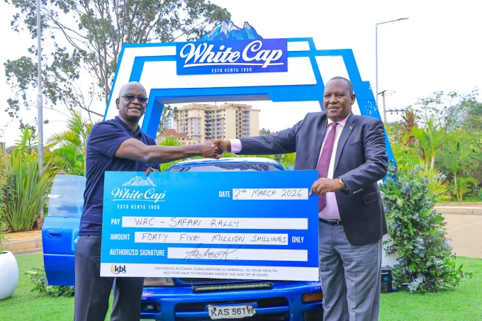 KBL Managing Director Andrew Kilonzo (L) presents White Cap’s sponsorship for the 2026 WRC Safari Rally Championship Ministry of Sports Representative Kipchumba Rutto.jpg