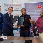 Absa Bank Kenya and officials from the Japanese firm at the signing ceremony