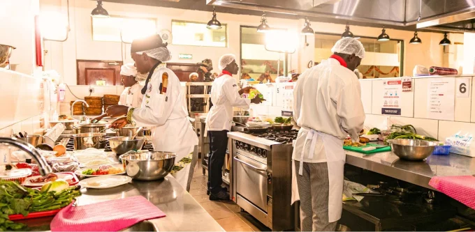 Culinary students in action at Boma International Hospitality College, showcasing skill, creativity, and precision in a dynamic, hands on kitchen environment..jpg