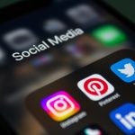 Phone displaying social media platforms. PHOTO/Pexels