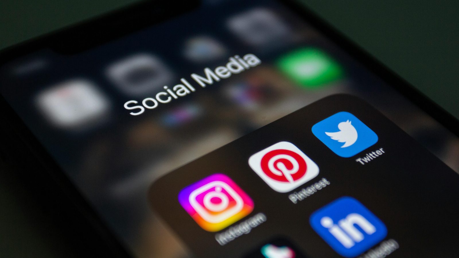 Phone displaying social media platforms. PHOTO/Pexels