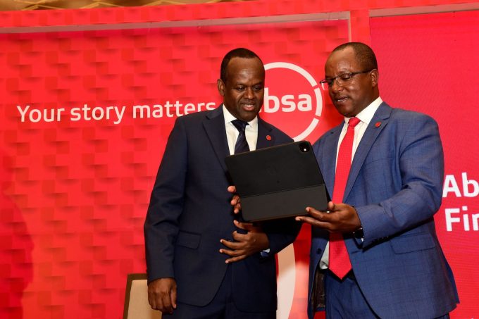 Absa Bank Kenya MD and CEO Abdi Mohamed with Chief Finance Officer Yusuf Omari