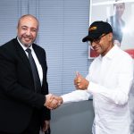 KQ AG CEO Capt. George Kamal and Trace Executive Chairman Olivier Laouchez shake hands following the signing of an MoU ahead of the Africa Forward Concert, marking a partnership focused on advancing African creativity, culture and connectivity.