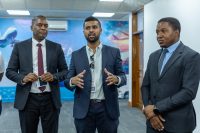 AQ Hamza, Group Director for International Trade Relations at Equity Group Holdings (centre) engaging with delegates at the Tanzania Trade Mission