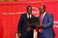 Absa Bank Kenya MD and CEO Abdi Mohamed with Chief Finance Officer Yusuf Omari