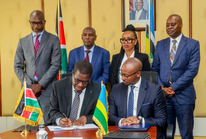 Energy and Petroleum Cabinet Secretary Opiyo Wandayi signs the deals in the company of his Rwandan counterpart Antoine Marie Kajangwe and other senior government officials.