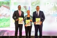 1. KenGen Managing Director and CEO Eng. Peter Njenga (Right) poses with Principal Secretary State Department for Environment and Climate Change Eng. Festus Ngeno (left) and UN Global Compact Kenya Executive Director Judy Njino during the launch of KenGen's inaugural Sustainability report at Karura Forest in Nairobi.