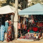 Colorful textile and fashion stalls in a Nairobi market