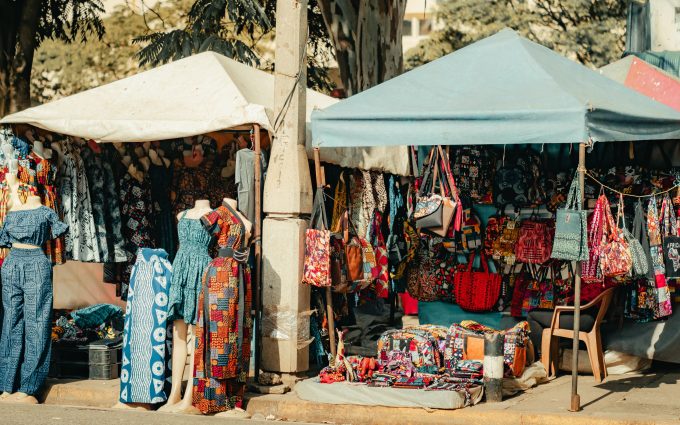 Colorful textile and fashion stalls in a Nairobi market