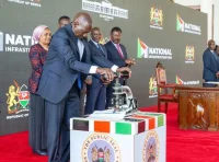President William Ruto while signing the National Infrastructure Fund Bill into law