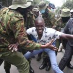 Saba Saba protester being arrested