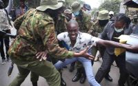 Saba Saba protester being arrested