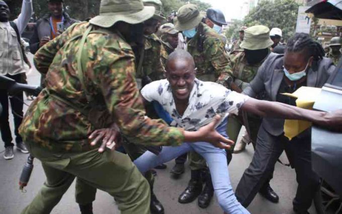Saba Saba protester being arrested