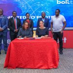 Jubilee Health Insurance CEO Njeri Jomo(seated left) and Boltech Africa General Manager Bente Krogmann during the partnership signing deal as other officials look on.