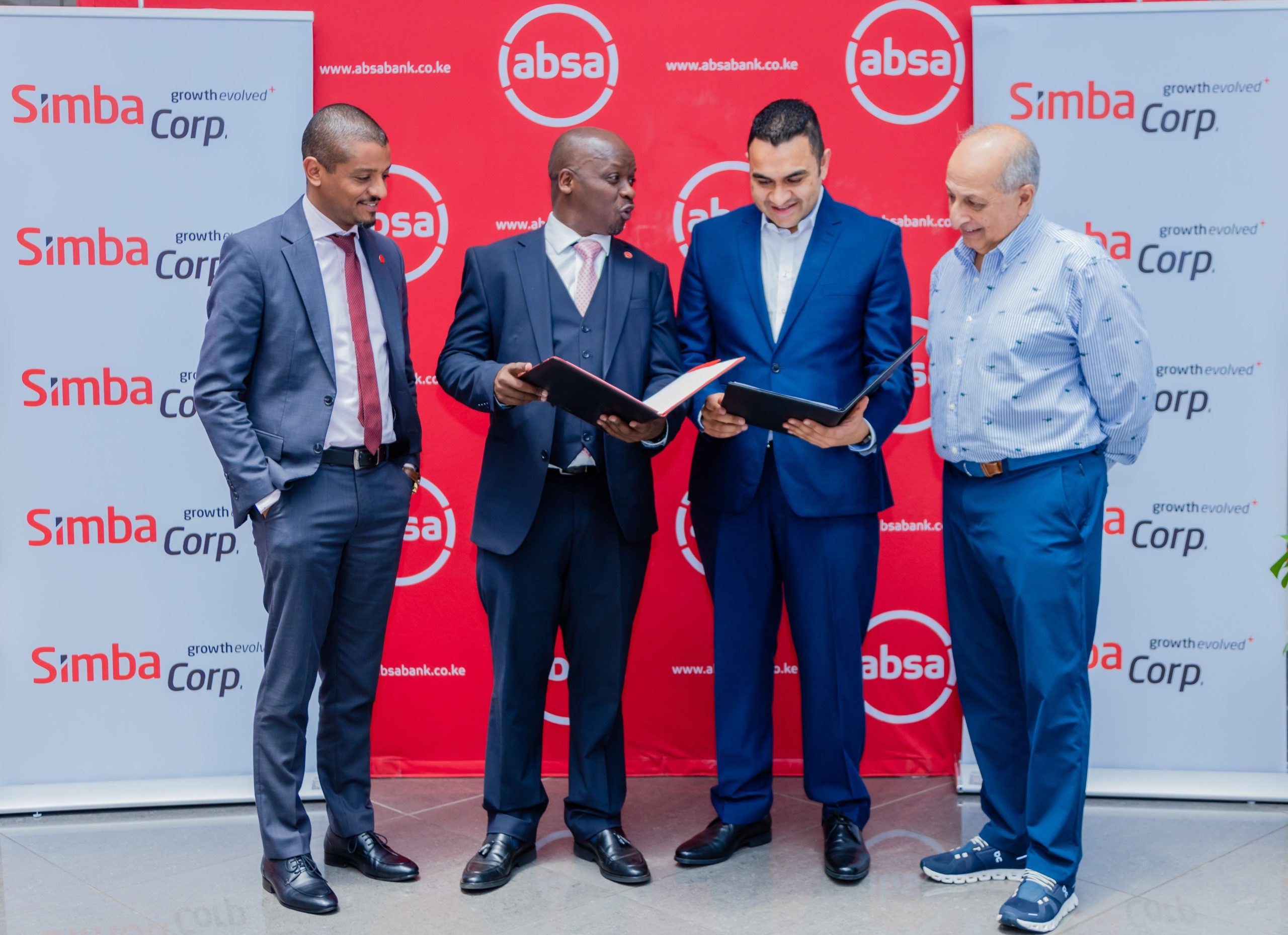 1- Absa Bank Kenya Business Banking Director Renato D’souza and Corporate & Investment Banking Managing Executive James Agin with Simba Corporation Executive Director Suraj Shah and Executive Chairman Adil Popat during the signing of a strategic Memorandum of Understanding (MoU) with Simba Corporation to expand access to vehicle and agricultural equipment financing solutions for individuals and businesses.