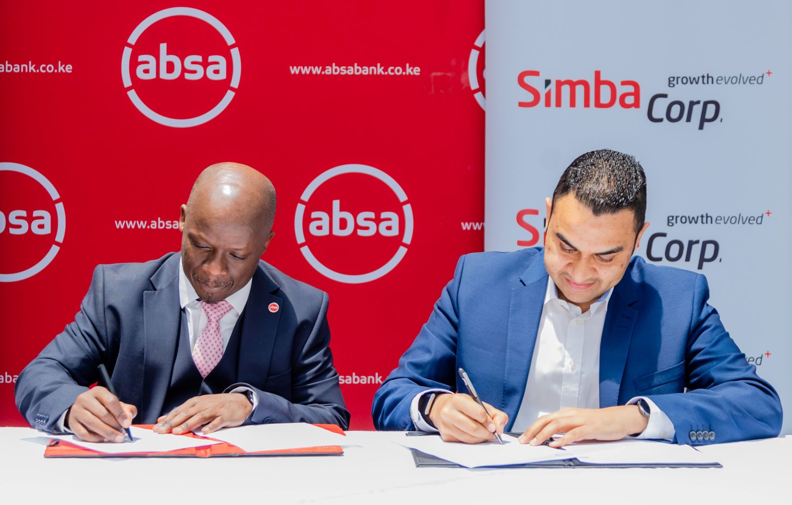 2- Absa Bank Kenya Corporate & Investment Banking Managing Executive James Agin with Simba Corporation Executive Director Suraj Shah sign a strategic Memorandum of Understanding (MoU) with Simba Corporation to expand access to vehicle and agricultural equipment financing solutions for individuals and businesses.