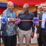 From left: Mary and Joseph Waigwa, Directors, Paints and Hardware, cut the ribbon to open Crown Paints’ new Xperience Centre in Mlolongo, Machakos County, as Group CEO Mustafa Turra looks on.